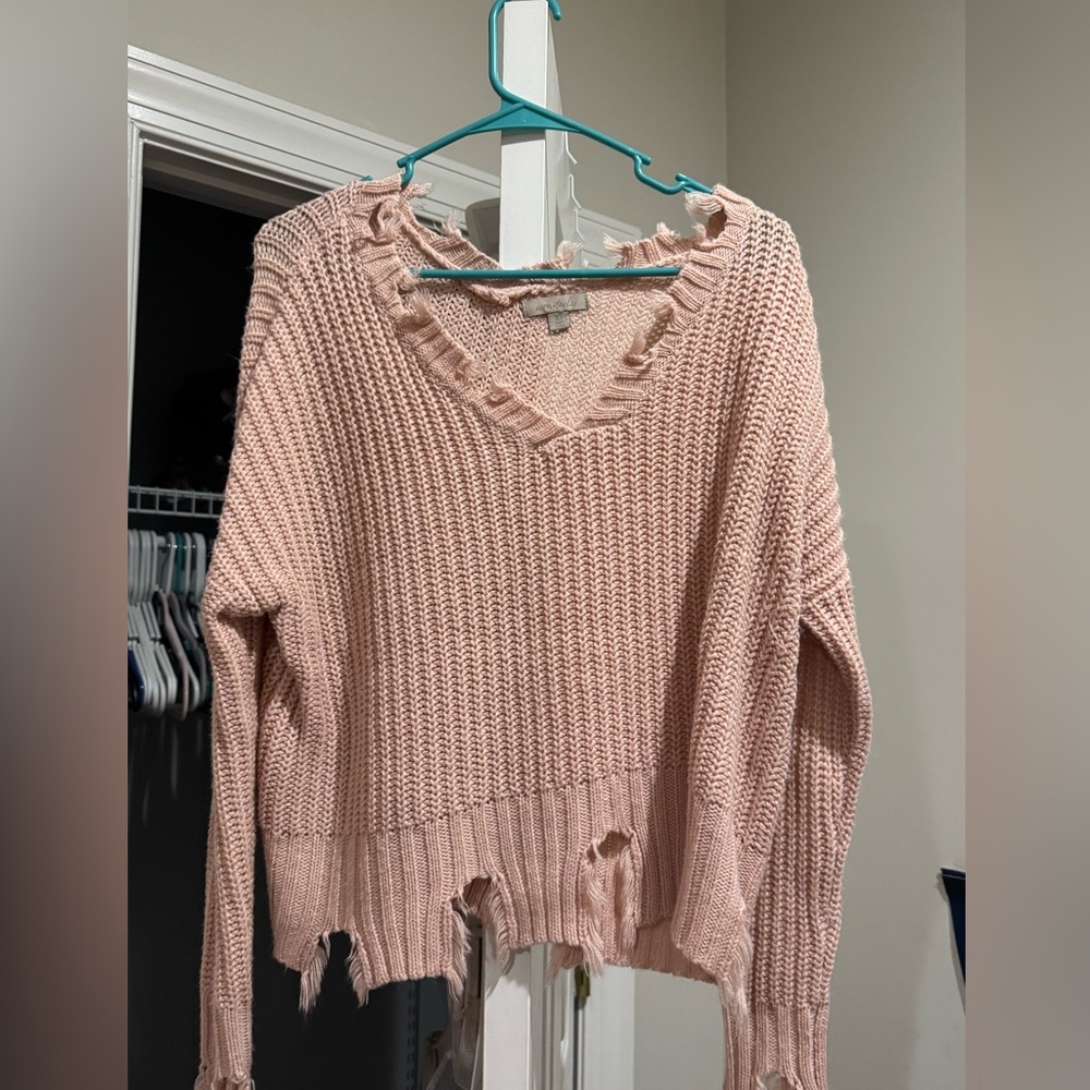 Pink knitted sweater